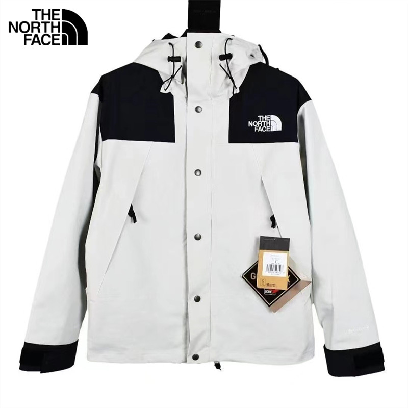 The North Face ปักโลโก้ Submachine Jackets GORE-TEX ผ้ากันน้ําเสื้อกีฬาสองด้านซิปชิปป้องกันการปลอมแป