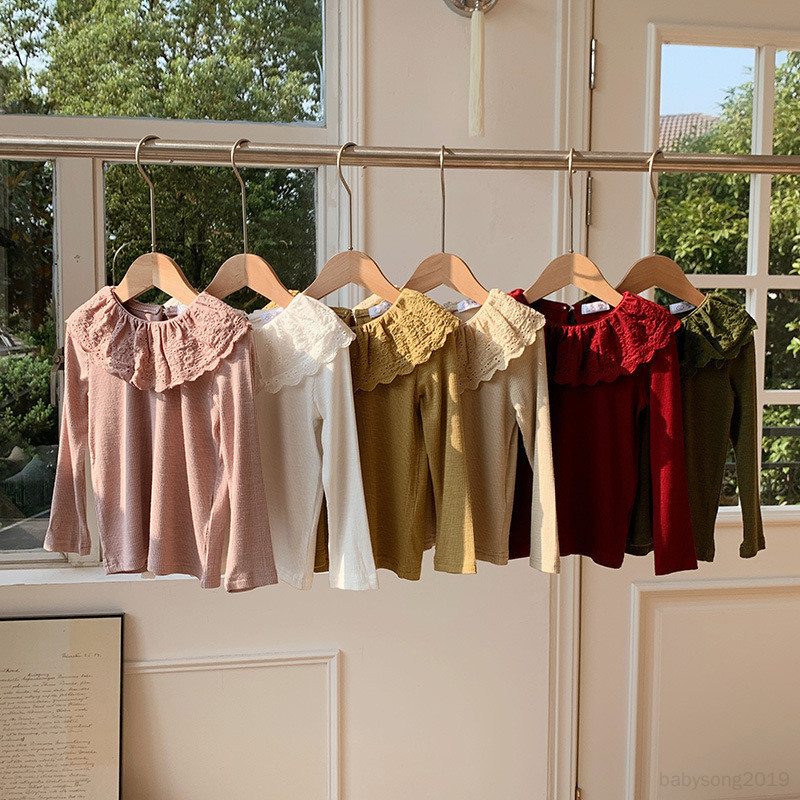 เด็ก Tshirt ตุ๊กตา Collar Ruffled Bottoming เสื้อสําหรับเด็กทารกฤดูใบไม้ผลิและฤดูใบไม้ร่วงสไตล์ป่าแขนยาวเสื้อยืด