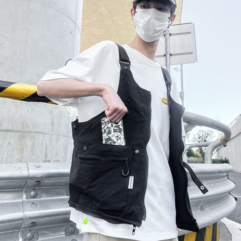 ## ชุดทํางานแบรนด์อินเทรนด์กระเป๋าสะพายข้างอเนกประสงค์พร้อมเสื้อกั๊กกระเป๋าขนาดใหญ่ที่ไม่ซ้ําใคร#潮牌工装两用斜挎包个性山系露营大口袋马甲 - รูปที่ 4