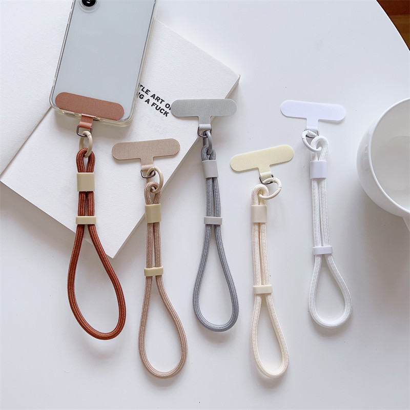 [PYM] High-End ปรับสีทึบถักโทรศัพท์มือถือ Lanyard แบบพกพาที่มีสีสันสายรัดข้อมือ All-Match แฟชั่นเครื่องประดับกลางแจ้ง Anti-Lost สายคล้องโทรศัพท์มือถือจี้