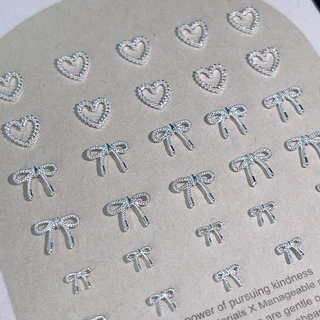 10ชิ้นชุดมินิโบว์แต่งเล็บเพชรเครื่องประดับ ผู้มีอิทธิพล ร้อนขายน่ารักหัวใจรักโบว์ผูกโลหะโลหะผสมสวมใส่เล็บอุปกรณ์แต่งเล็บ
