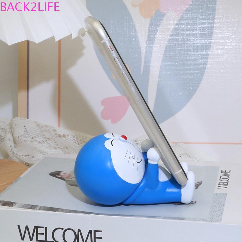 กลับ2ชีวิต โดราเอมอนตุ๊กตาที่วางโทรศัพท์,เครื่องประดับตุ๊กตาสัตว์โดราเอมอนขาตั้งโทรศัพท์มือถือ,ตกแต่งโต๊ะสากลน่ารัก ดิงดัง แมวโดราเอมอนรุ่นของเล่นโ