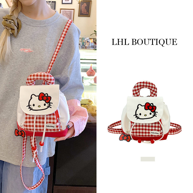 LHL BOUTIQUE กระเป๋าเป้  ตาข่ายสีแดง ผ้าใบ hello Kitty bag การ์ตูนวาย สวยๆ