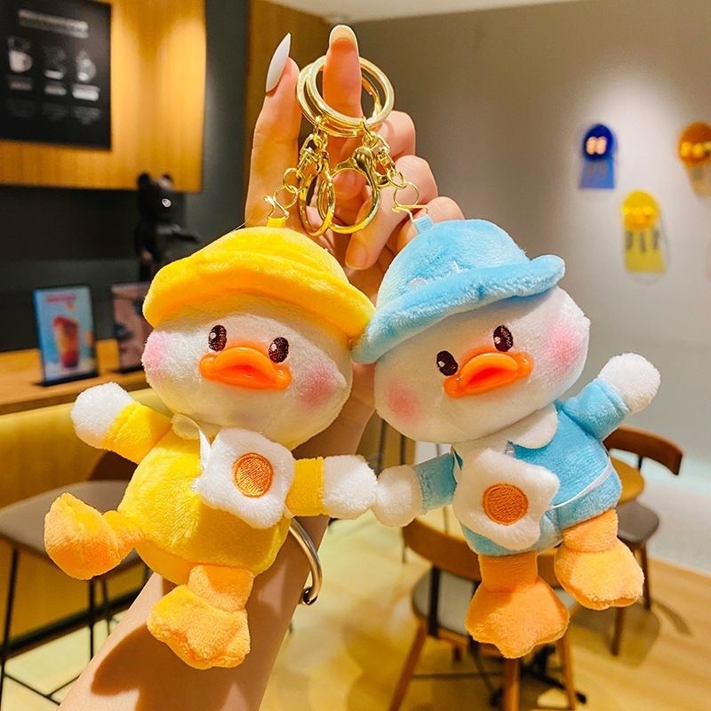 ตุ๊กตาการ์ตูนตุ๊กตาพวงกุญแจน่ารักสร้างสรรค์กระเป๋านักเรียนตุ๊กตากระเป๋าเป้จี้กระเป๋าคู่รักเครื่องประดับของขวัญ