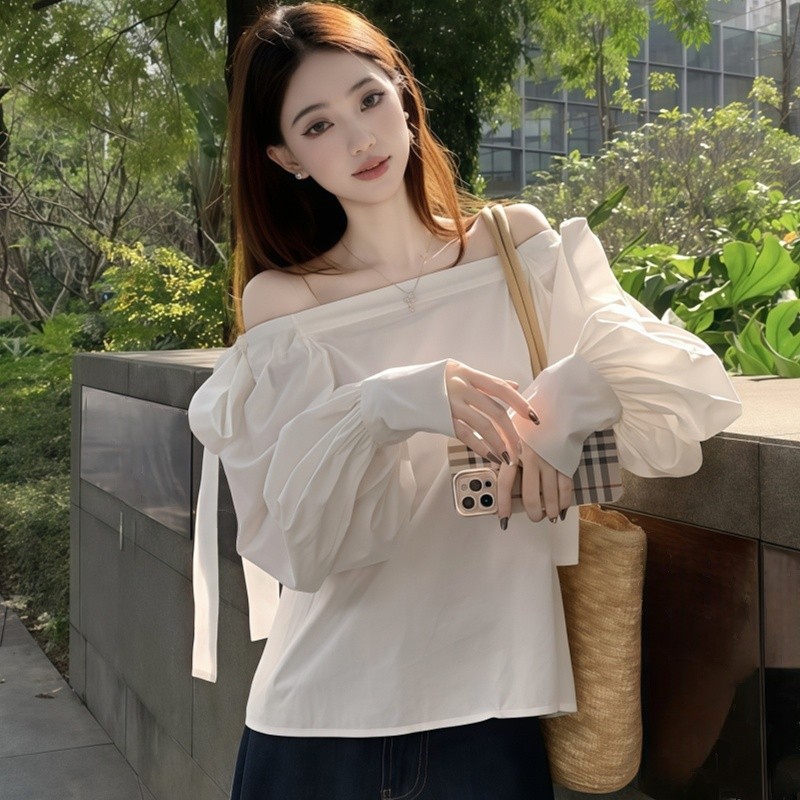 Chic พร้อมส่ง เสื้อแขนยาว ปาดไหล่ แต่งผูกโบว์ข้างตัว น่ารักมาก รุ่นสม็อคแขน ปล่อยชาย ผ้าคอตตอน สำหรับสาวหวาน ใส่ไปคาเฟ่