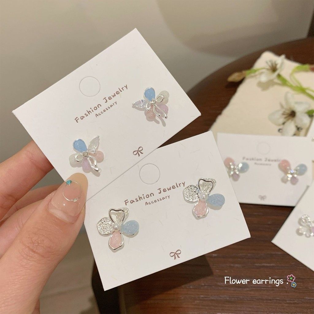 ดอกไม้ผิดปกติต่างหูผู้หญิงเวอร์ชั่นเกาหลีฤดูใบไม้ผลิฤดูร้อนสไตล์ใหม่ผีเสื้อที่มีสีสันเข็มเงินต่างหูแฟชั่นซอกดอกไม้นางฟ้าระดับไฮเอนด์ต่างหูโบว์นักเร