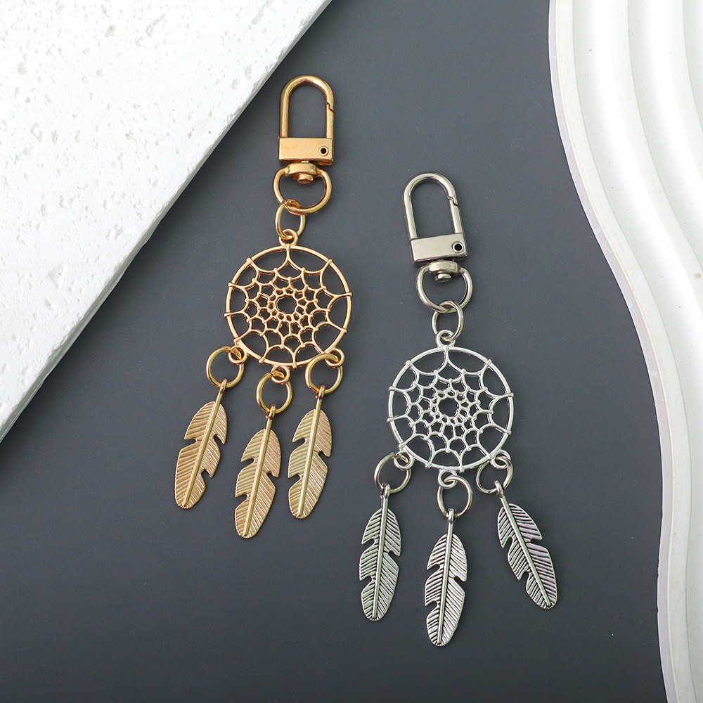 Simple Hollow Dreamcatcher พวงกุญแจ Vintage Feather โลหะพวงกุญแจกระเป๋าถือเครื่องประดับของที่ระลึกเพื่อน