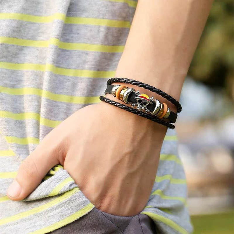 COD สร้อยข้อมือถักด้วยมือ ONE PIECE ลูฟี่ Vintage Cowhide Punk Style สร้อยข้อมือเครื่องประดับยอดนิยม-a.one