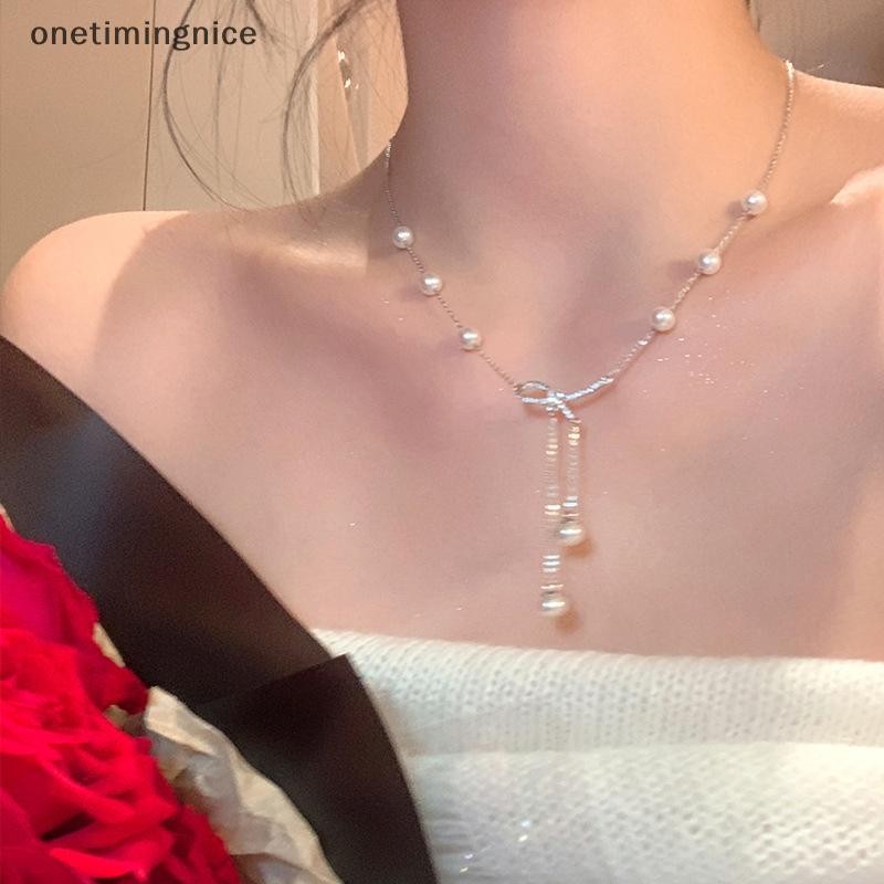 Onetimingnice ผู้หญิงน้ําหนักเบาสร้อยคอ Elegant Faux Pearl Butterflies Choker สร้อยคอปรับ Chain OTN