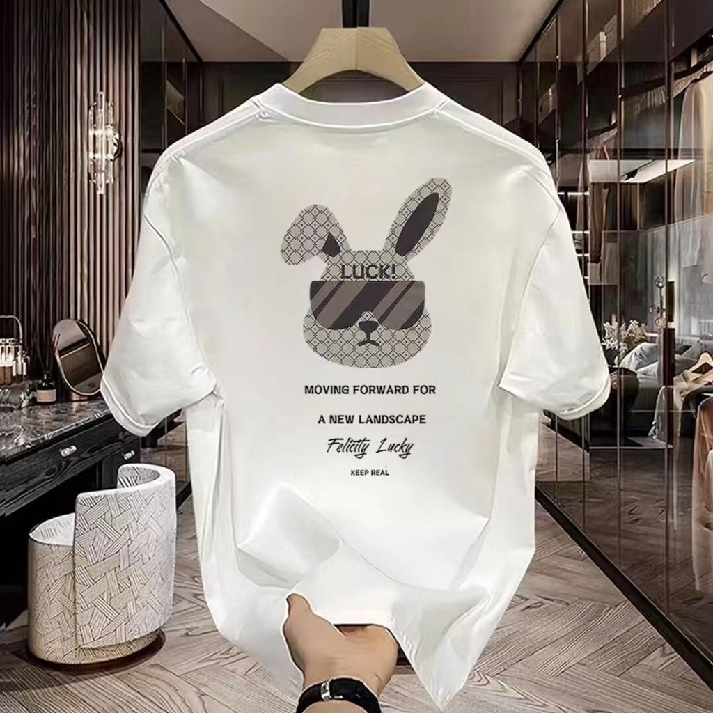 YOU-T เสื้อยืดโอเวอร์ไซส์ คุณภาพสูง ไม่จำกัดเพศ เสื้อยืดผ้าฝ้าย สวมใส่สบาย สไตล์เกาหลีเรียบง่าย พิมพ์ "กระต่ายนำโชค"