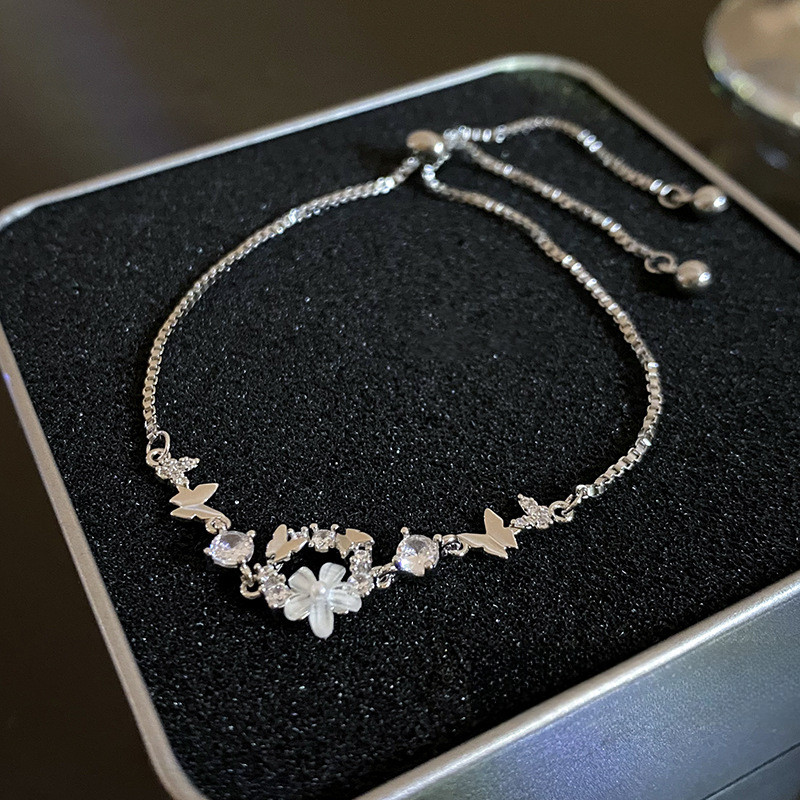 สร้อยข้อมือแฟชั่นดอกไม้ปรับสแตนเลสผีเสื้อผู้หญิงสร้อยข้อมือ