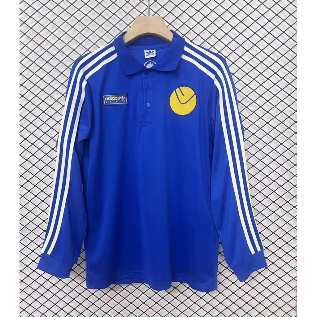 2425 Leeds United เสื้อฟุตบอลแขนยาวย้อนยุคลําลองสีน้ําเงินย้อนยุคแขนยาว
