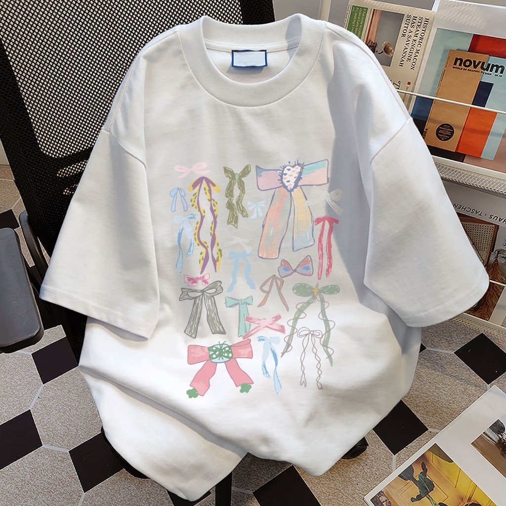 เสื้อสีชมพู  เสื้อโบว์ โอเวอร์ไซส์ เสื้อยืดผู้หญิงลายน่ารัก เนื้อผ้านุ่ม สีสวย ใส่สบาย