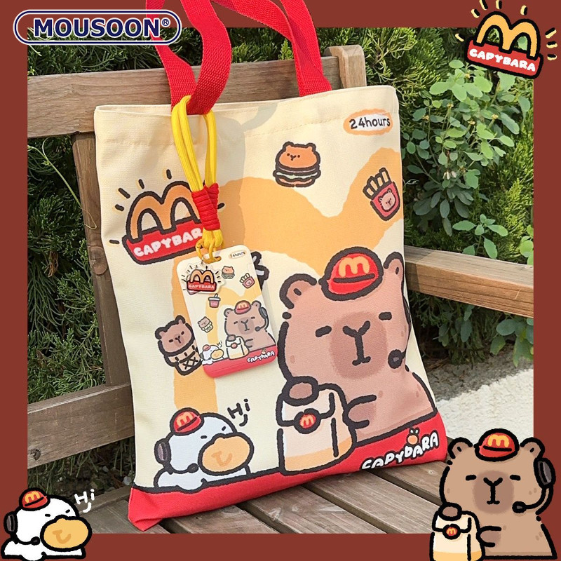 Mousoon กระเป๋าถือผ้าใบ Capribara เปิดการ์ตูนทุกวันขนาดใหญ่ความจุกระเป๋าสะพาย McDonalds Capybara