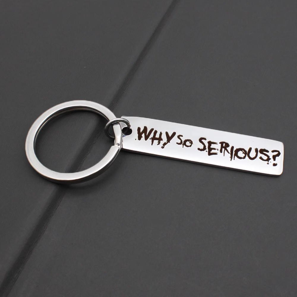 Batman Joker พวงกุญแจ WHY SO SERIOUS ตัวอักษรสแตนเลสแกะสลัก Creative จี้พวงกุญแจงานอดิเรกคอลเลกชันของที่ระลึกของขวัญ