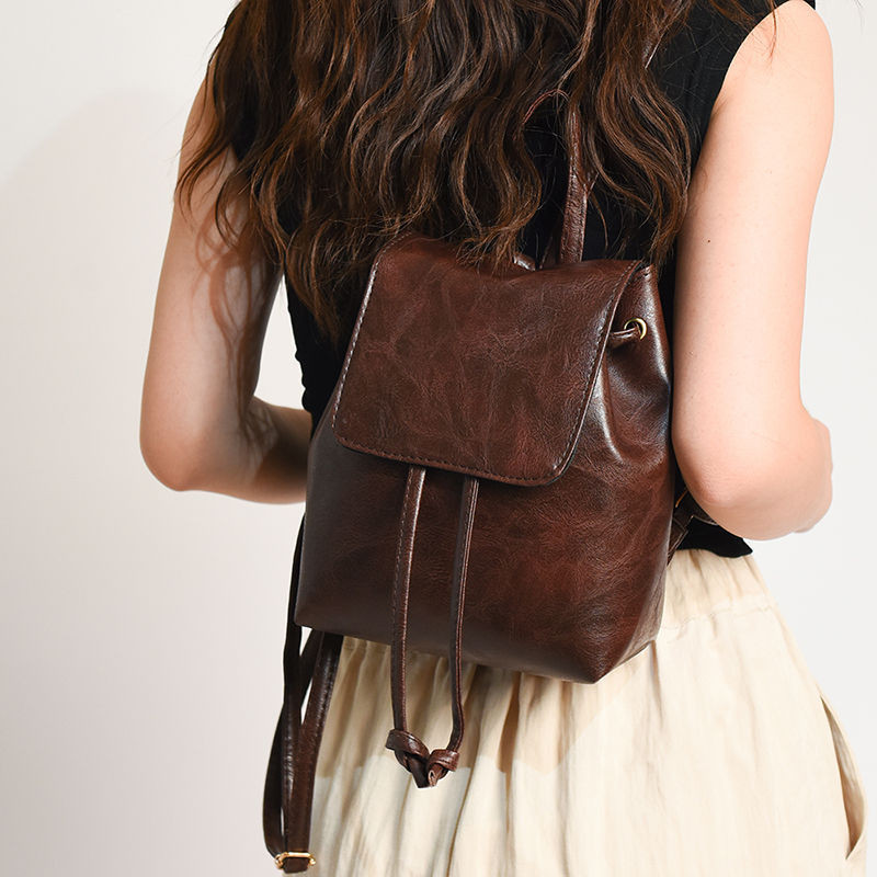 กระเป๋าเป้สะพายหลังใหม่ที่เรียบง่ายและหลากหลายศิลปะสไตล์ drawstring ไหล่