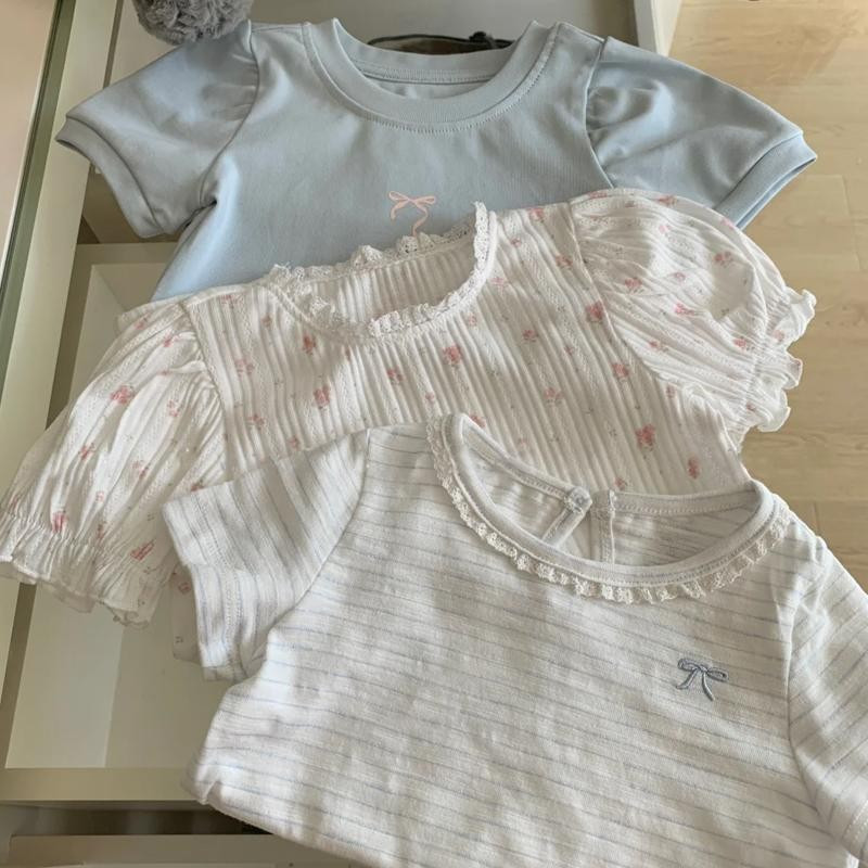 เสื้อผ้าเด็กเกาหลีเสื้อยืดแขนสั้นเด็กฤดูร้อนสไตล์ใหม่ผ้าฝ้ายแท้เด็กน่ารักแขนพัฟรอบคอเสื้อยืดด้านบน