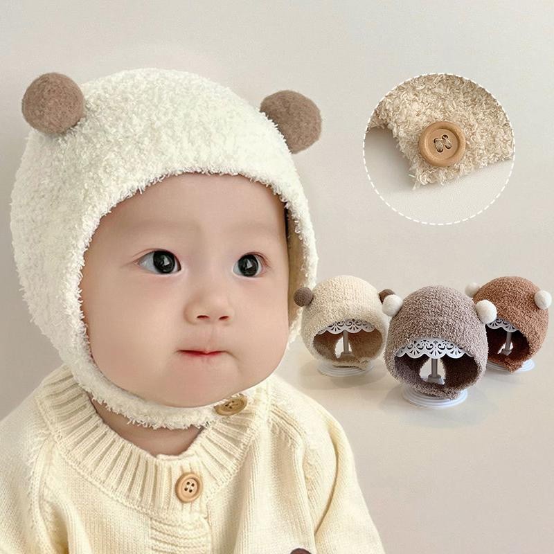 น่ารัก Pompom หมวกบีนนี่เด็กฤดูใบไม้ร่วงฤดูหนาวที่อบอุ่นตุ๊กตาเด็กทารกชายหญิงป้องกันหูหมวกสีทึบสบายเด็กวัยหัดเดินหมวก