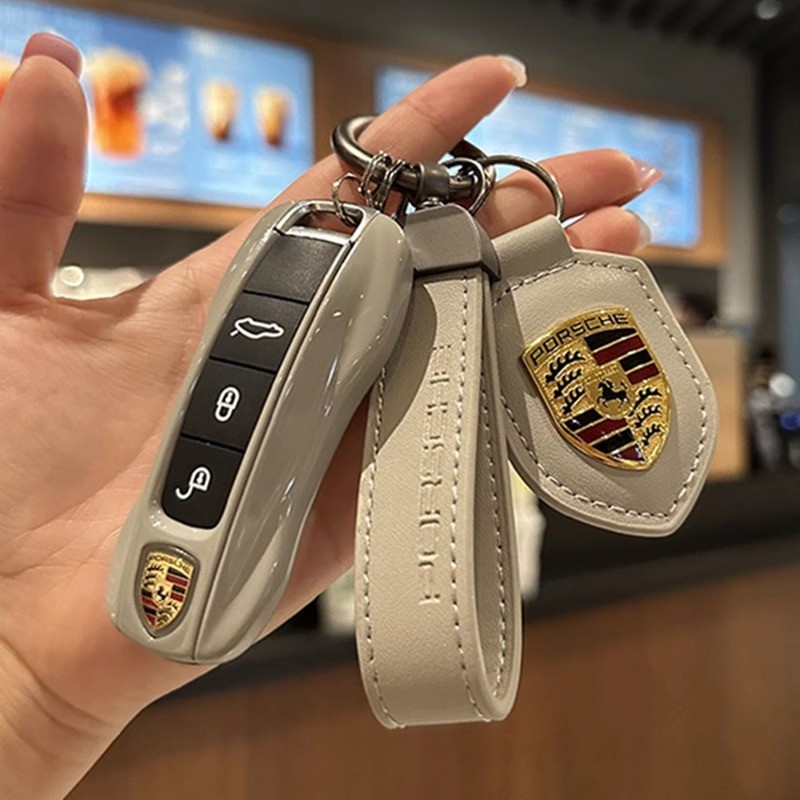 Porsche Cayenne Matte Grey Key Shell เหมาะสําหรับ Macan Panamera 718 Taycan 911 Shield Buckle ของขวัญรถใหม่