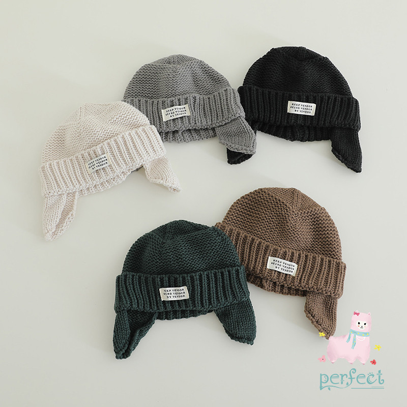 เวอร์ชั่นเกาหลีเด็กถักป้องกันหูหมวกชายหญิงฤดูหนาวสไตล์ใหม่สีทึบ ทั้งหมด-จับคู่ เดินทางหมวกขนสัตว์อบอุ่นเสื้อสวมหัวหมวก
