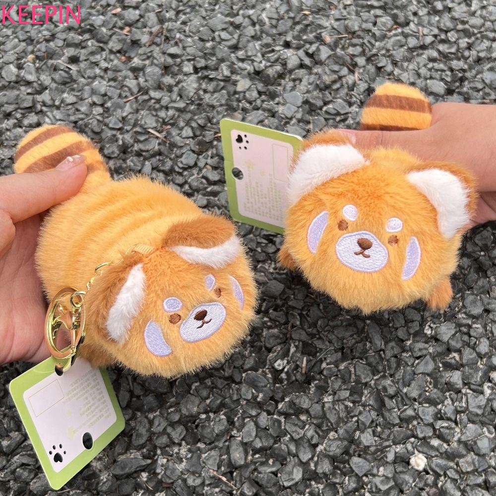 เก็บไว้ พวงกุญแจตุ๊กตาแพนด้าสีแดง,พร้อมหางสัตว์เปลี่ยนเป็นเครื่องแต่งกายจี้แพนด้า,กระเป๋าหูฟังตลกการ์ตูนน่ารักสีแดงแพนด้ากระเป๋าเด