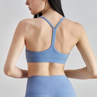 เสื้อกั๊กวิ่งกีฬาฟิตเนสสายเปลือยใหม่พร้อมเบาะสําหรับผู้หญิง