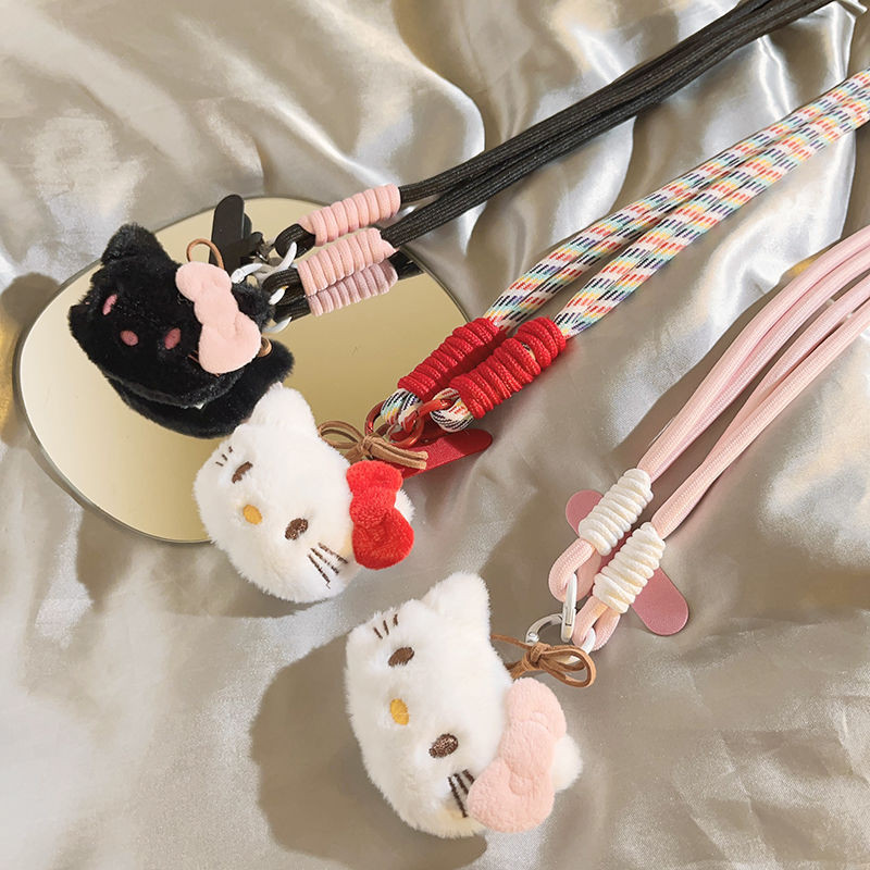สินค้าใหม่พร้อมสต็อกการ์ตูนโบว์สีแดงสีขาว เคที แมวเคสโทรศัพท์สไตล์ยาวแขวนโซ่ตุ๊กตาตุ๊กตาแขวนไหล่แขวนคอโทรศัพท์ในแนวทแยงยาวเชือก20241030