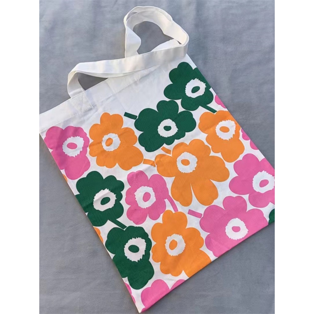สินค้าใหม่ marimekko Finnish Xicha Co-Branded กระเป๋าผ้าใบบางไหล่เดียวแฟชั่นเป็นมิตรกับสิ่งแวดล้อมกระเป๋าช้อปปิ้งพับ