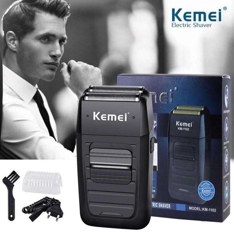 Kemei KM-1102เครื่องโกนหนวดแบบไร้สายใบมีดแฝดลูกสูบเครามีดโกน​