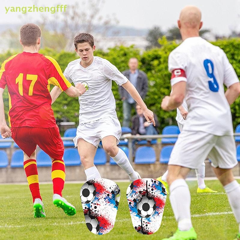 [yangzhengfff] 1 คู่ฟุตบอลสนับแข้งฟุตบอลการฝึกอบรมขายามอุปกรณ์ป้องกันสวมทนดูดซับแรงกระแทกขาปกป้อง [ใหม่]