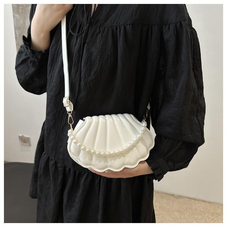 TONFASHION กระเป๋าสะพายข้าง น่ารักด้วยมุกออกแบบเชลล์กระเป๋าสะพายหนัง PU ทนทาน Minimalist Pearl ตกแต่งกระเป๋าถือสําหรับผู้หญิงสาว - รูปที่ 7