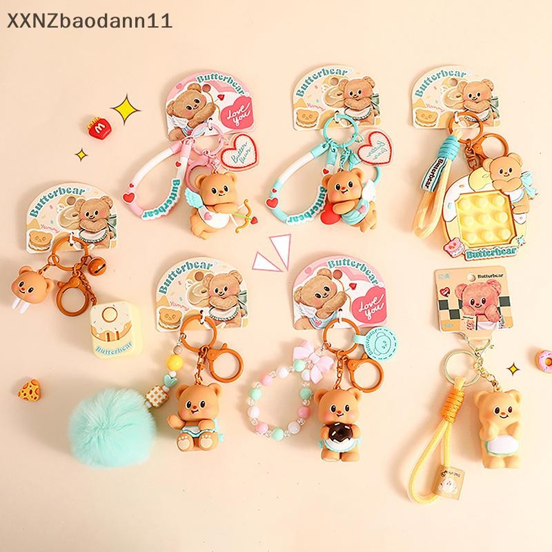 Xnz การ์ตูนสร้างสรรค์หมีลูกปัดพวงกุญแจสําหรับผู้หญิงสาวแฟชั่นน่ารักหมีตุ๊กตากระเป๋าถือจี้ น่ารัก กระเป๋าเป้สะพายหลังตกแต่งของขวัญ MHF