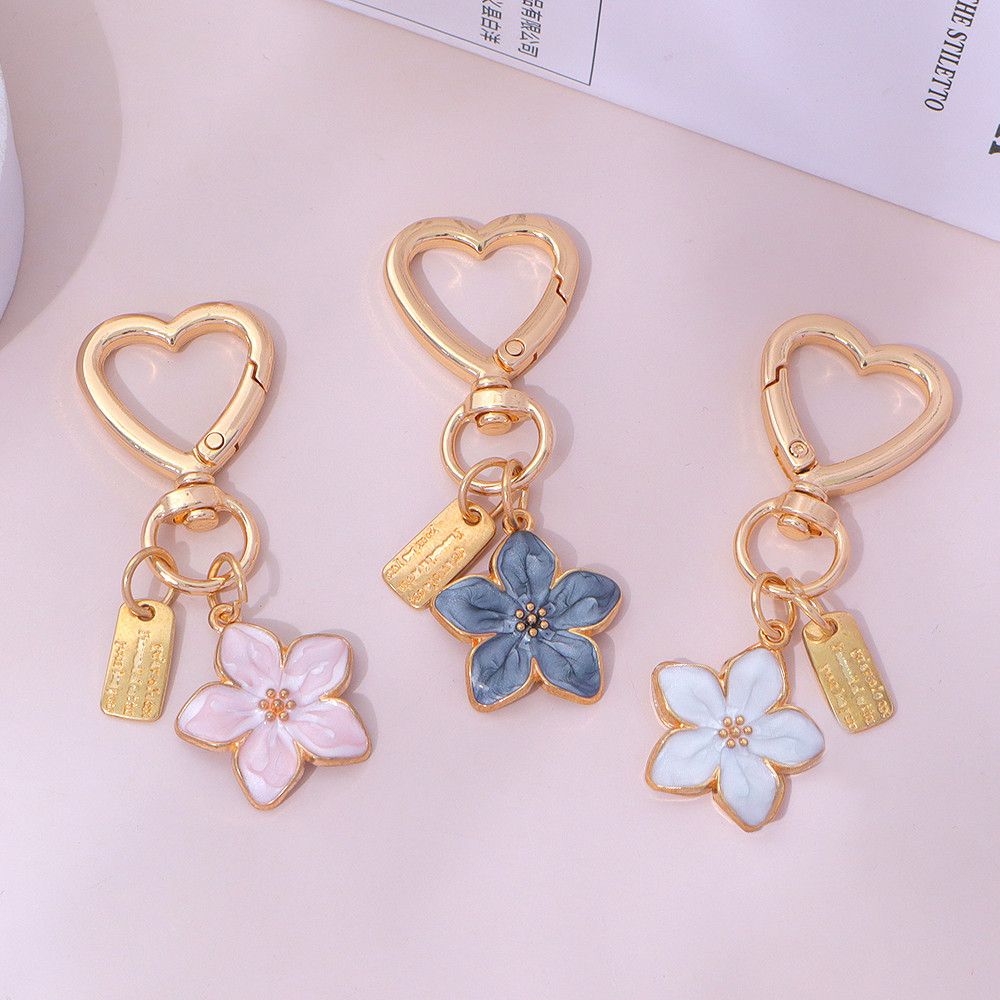 Creative Heart ปุ่มพวงกุญแจน่ารักเคลือบ Cherry Blossom Key แหวนผู้หญิงกระเป๋าหูฟังจี้
