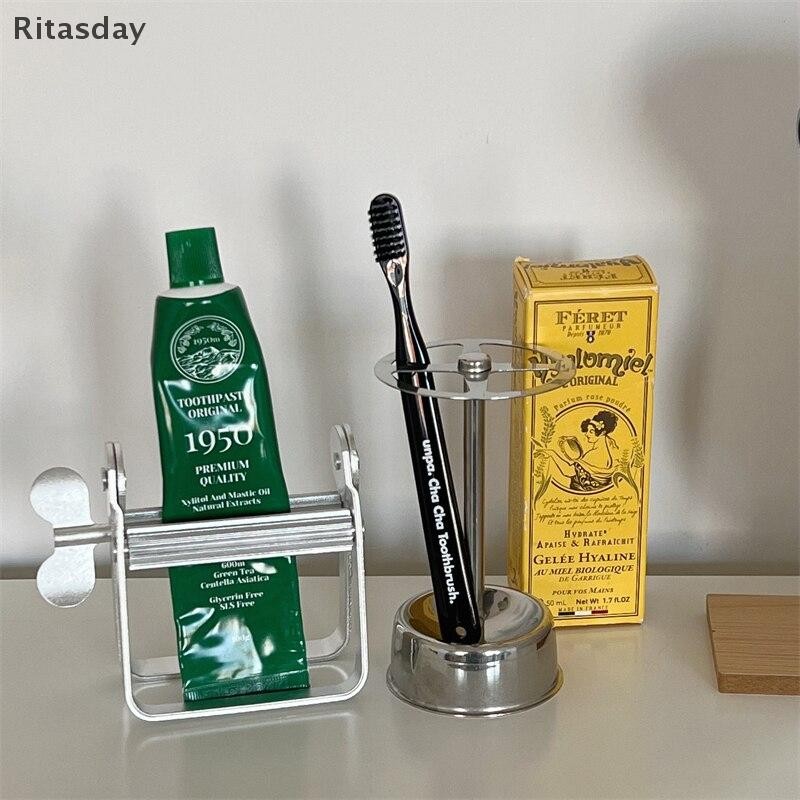 Ritasday สแตนเลส Frosted ยาสีฟันครีมทามือซอส Extruder ในครัวเรือนอุปกรณ์ห้องน้ําชั้นวางแปรงสีฟันฟันวาง Dispenser ใหม่
