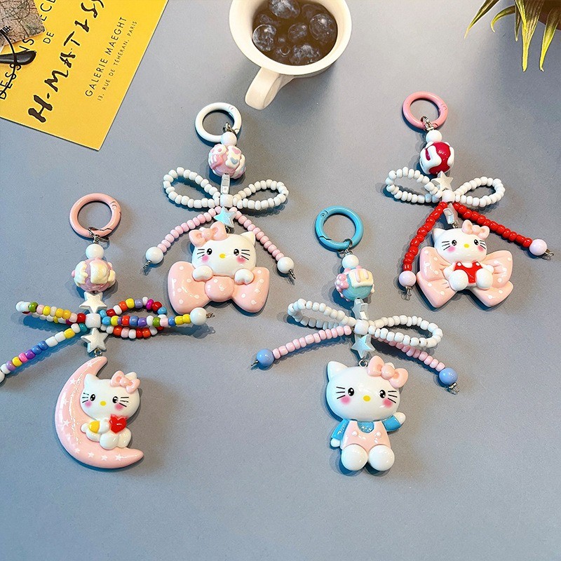 SANRIO ซานริโอ น่ารัก โทรศัพท์เชือกเส้นเล็ก สวัสดี คิตตี้ป้องกันการสูญหายเชือกเส้นเล็กที่สําคัญข้อมือสั้นเชือกเครื่องประดับสีแดงพวงกุญแจลูกปัดโทรศัพท์โซ่ของข