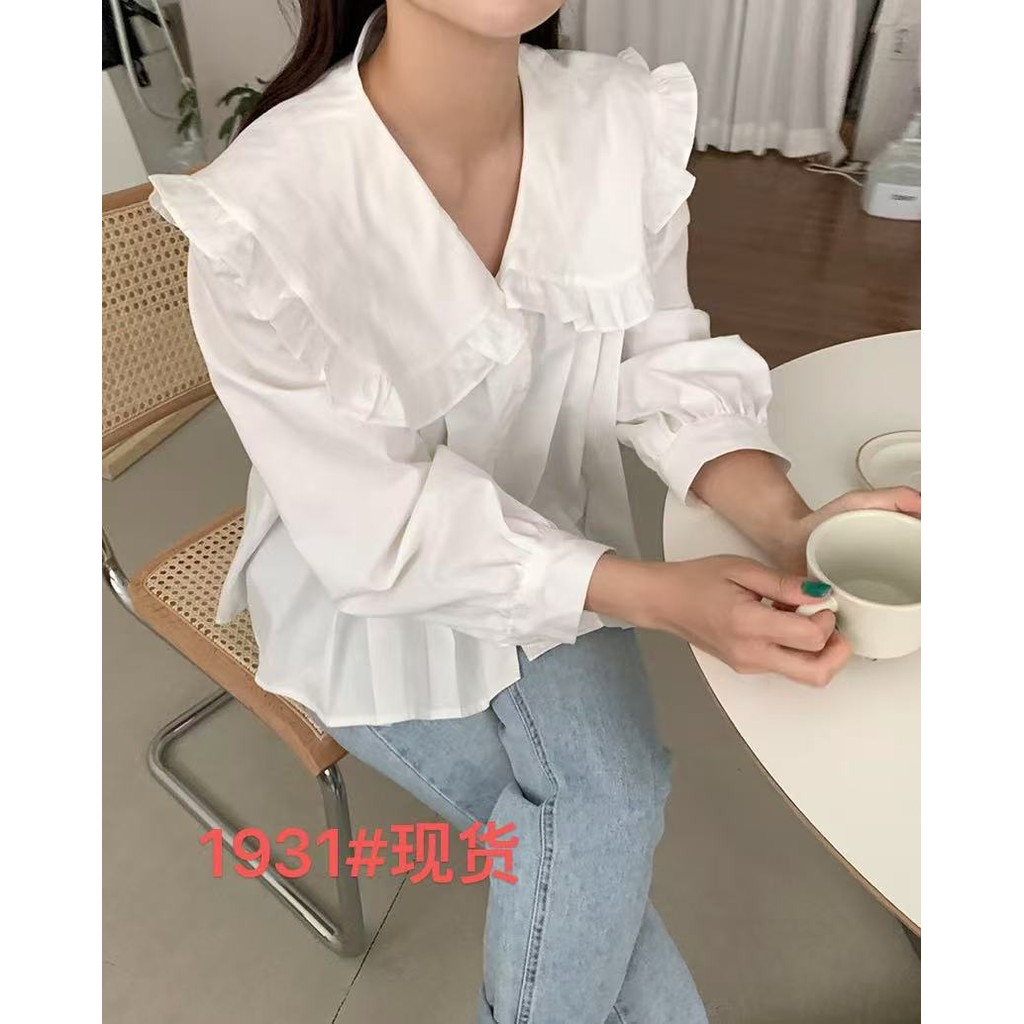 เสื้อเชิ้ตจับจีบ คอตุ๊กตา จาก Xide Me Pin C1NS