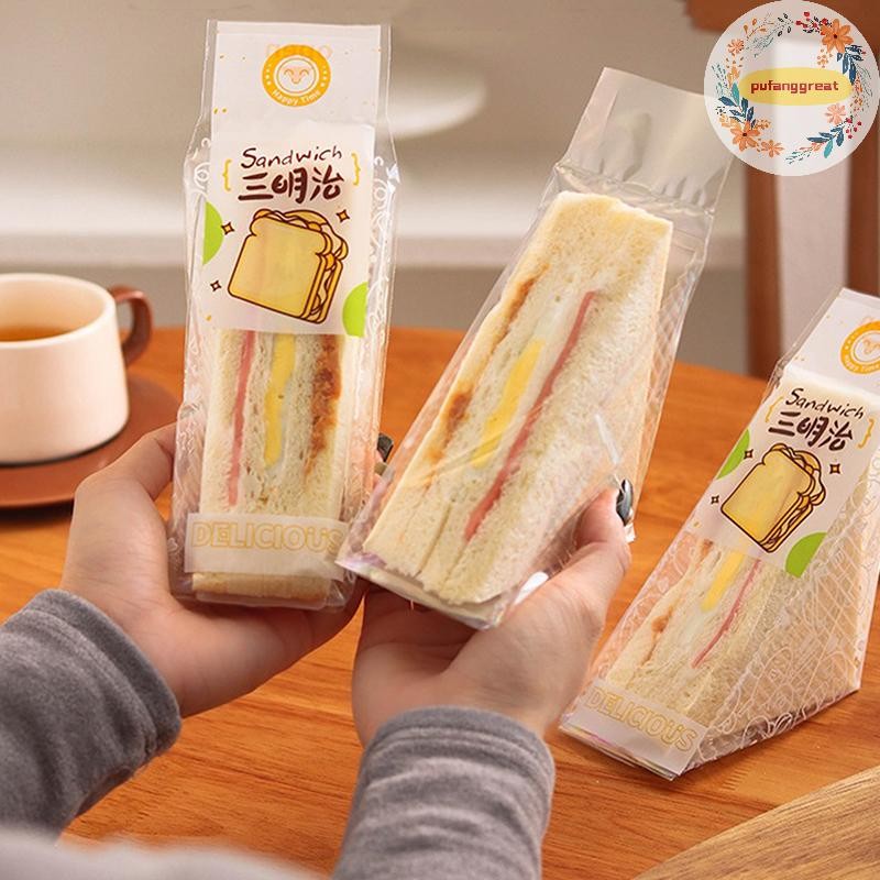 Pufanggreat 100pcs แซนวิชบรรจุภัณฑ์พลาสติกโปร่งใสสามเหลี่ยมกระเป๋าสําหรับขนมปัง Butty กระเป๋าตกแต่งวันเกิด Treat TH