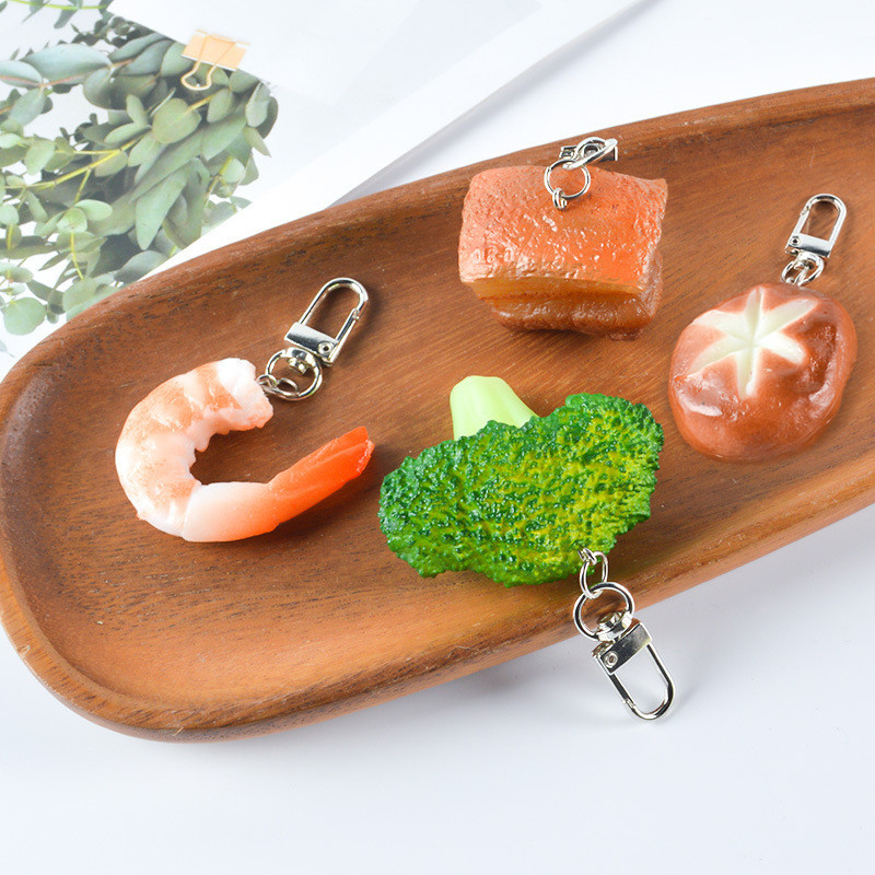 มินิกุ้งบรอกโคลีจําลองอาหารพวงกุญแจพีวีซีตุ๋นหมูซี่โครงพวงกุญแจรถจี้อุปกรณ์เสริม