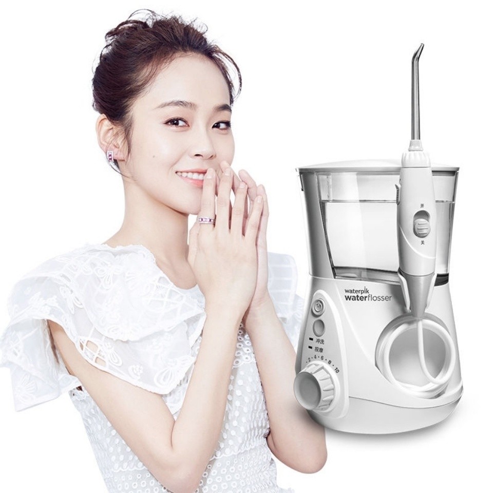 Waterpik WP660 ไหมขัดฟันไฟฟ้า 7 หัวสเปรย์ทําความสะอาดช่องปากดูแลหมากฝรั่ง 10 ระดับการปรับ