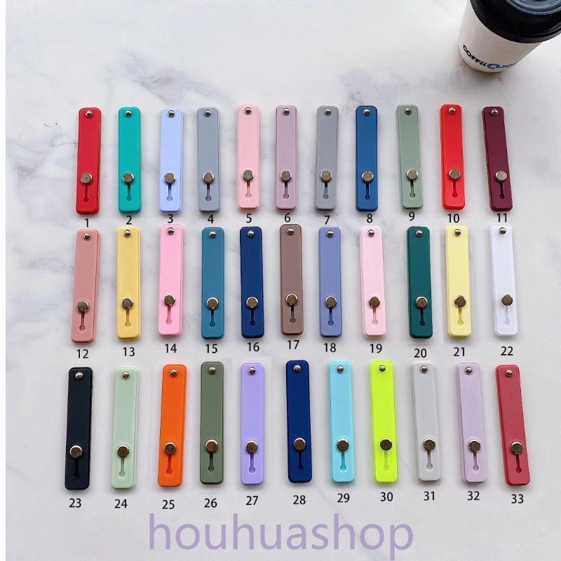 1ชิ้นสากลโทรศัพท์มือวงสร้อยข้อมือซิลิโคนที่วางโทรศัพท์แหวนนิ้วกดดึงยึดยืนสติ๊กเกอร์ที่วางโทรศัพท์ (สีสุ่ม)