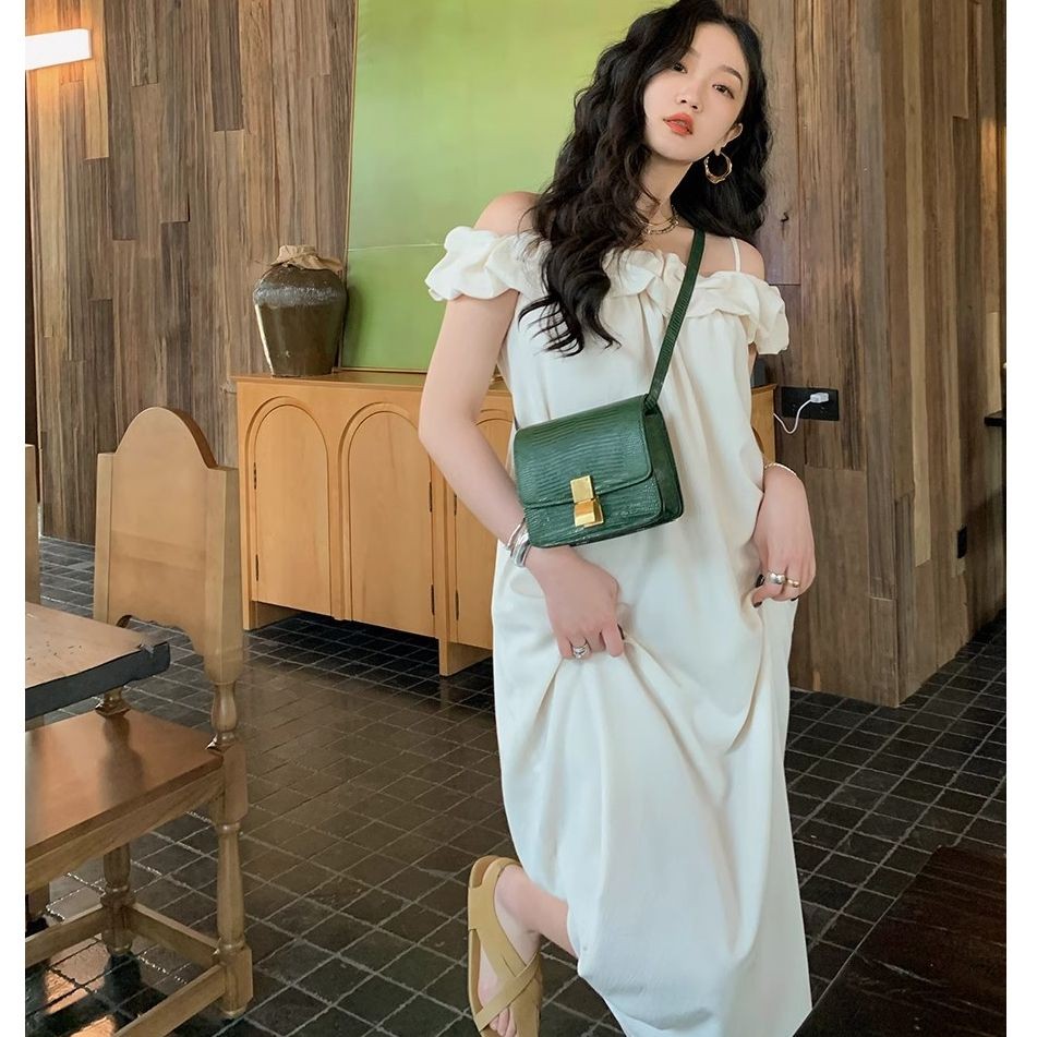 ชุดเดรสสายเดี่ยวเปิดไหล่สไตล์ฝรั่งเศสแอปริคอท2025ฤดูร้อนแบบใหม่กระโปรงยาวเปิดไหล่เรียบหรูสำหรับวันหย