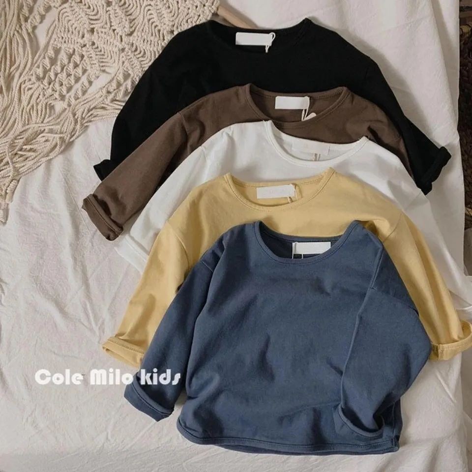 เสื้อยืดแขนยาวเด็กชายฤดูใบไม้ผลิฤดูใบไม้ร่วงแฟชั่นสไตล์ใหม่เวอร์ชั่นเกาหลีผ้าฝ้ายแท้คอกลมสีทึบหลวมสบายๆนุ่มสบายทุกการแข่งขันด้านบน