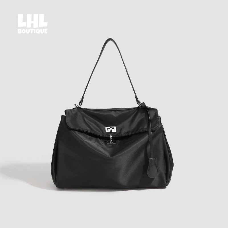 LHL BOUTIQUE ใหม่พิเศษที่น่าสนใจการออกแบบผ้าไนลอนกระเป๋าอเนกประสงค์ความจุขนาดใหญ่พร็อพกระเป๋าสะพาย Messenger ได้แบบพกพา