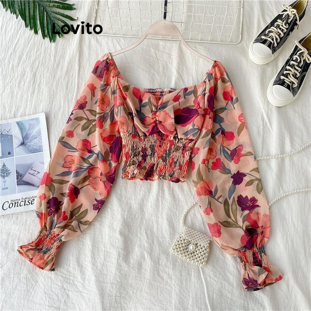 Lovito เสื้อเบลาส์พิมพ์ลายดอกไม้ ดิทซี่ หรูหราสำหรับผู้หญิง LNL71108