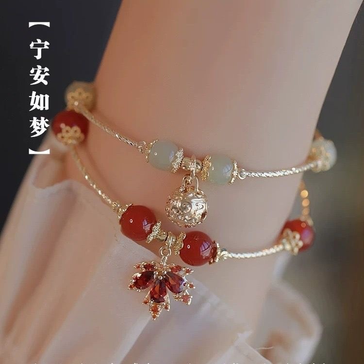 สร้อยข้อมือสาวใบเมเปิ้ลสร้อยข้อมือจี้ระฆังสไตล์ซ้อนซอกสไตล์ใหม่พระราชวังออกแบบสร้อยข้อมือเฉพาะ