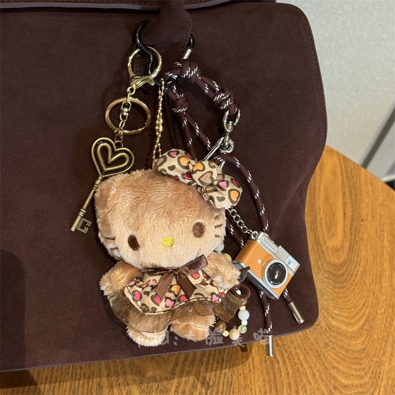 Hello Kitty ตุ๊กตาตุ๊กตาตุ๊กตากระเป๋าจี้พวงกุญแจการ์ตูนเสือดาวพิมพ์ตุ๊กตาจี้ของขวัญสําหรับเด็กผู้หญิง