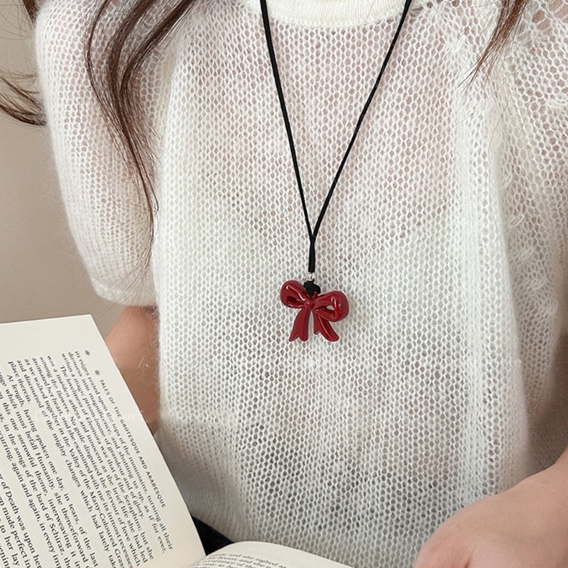 IOR Bowknot Heart สร้อยคอเชือกยาวสร้อยคอจี้เรซิ่น Texture Charm สร้อยคอปัจจุบันสําหรับสุภาพสตรีมีสไต