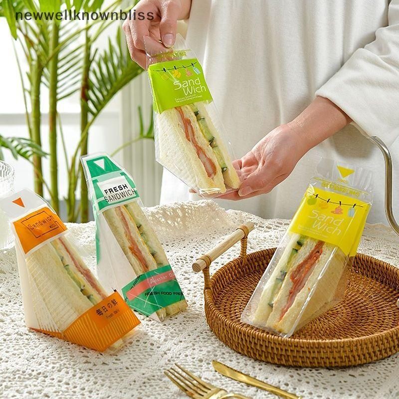 ใหม่wellknownbliss 100 ชิ้นของห่อแซนวิชพิเศษทิ้งง่ายต่อการฉีกขาดโปร่งใสสามเหลี่ยมถุงบรรจุภัณฑ์เค้ก CCD