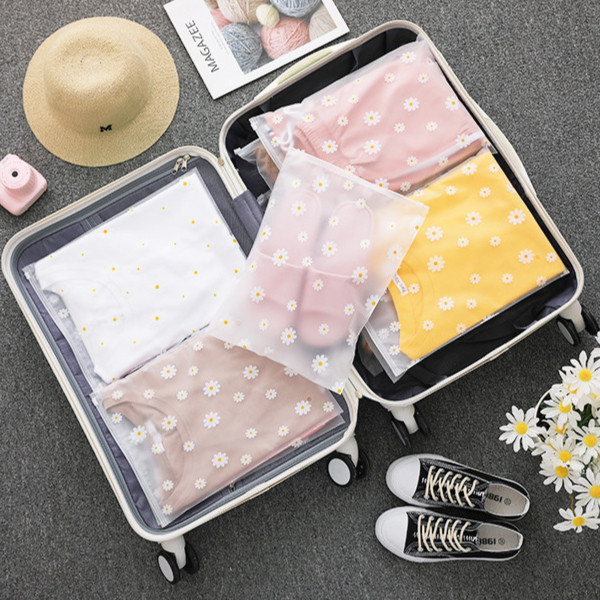 ถุงซิปใส่เสื้อผ้าลายดอกเดซี่  ถุงเก็บของเดินทาง บรรจุเสื้อผ้า ถุงบรรจุภัณฑ์พลาสติกPE พร่อมส่ง - รูปที่ 2
