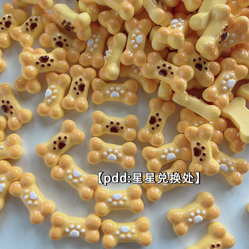 บิสกิตสีเหลืองอบอุ่นกรงเล็บแมวกระดูกเรซิ่นเครื่องประดับอุปกรณ์ DIY เคสโทรศัพท์ครีมกิ๊บติดผมที่ใส่บัตรทำด้วยมือวัสดุ DIY